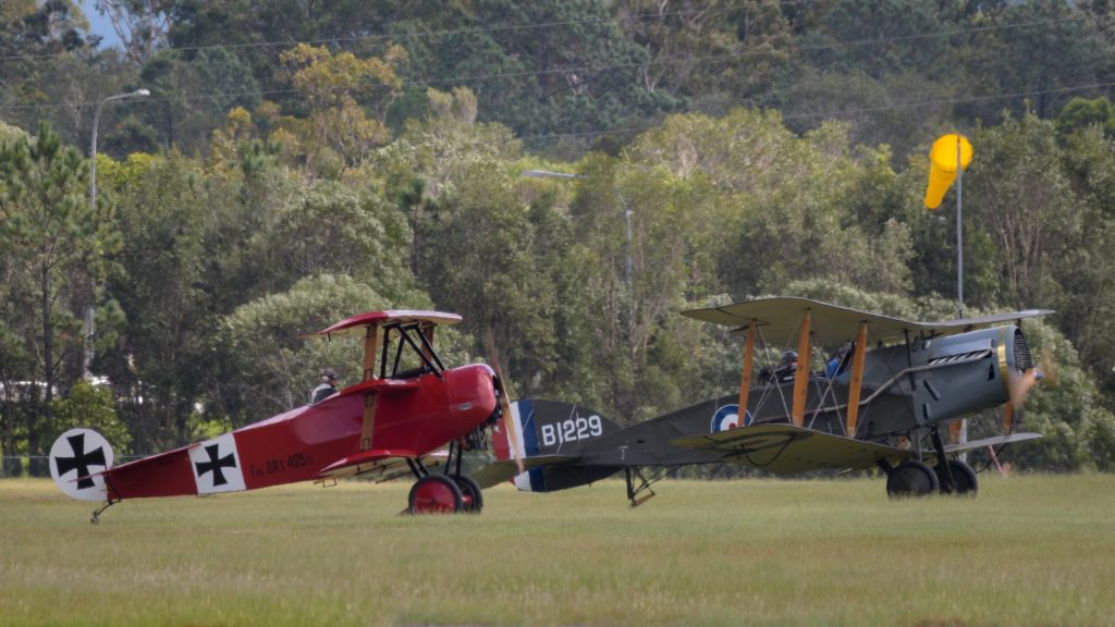 Fokker DR.1 Triplane VH-FXP and Bristol Fighter F2B VH-IIZ readying for takeoff at TAVAS GWFD 2018.