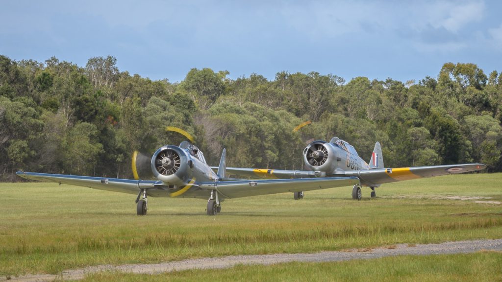 CAC CA-16 Wirraway VH-MFW and North American SNJ-4 Texan VH-NAG taxiing at TAVAS GWFD 2018.