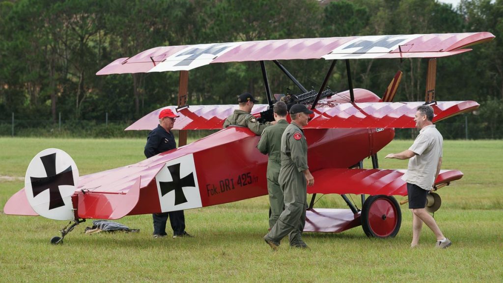 Staff from No.1 SQN RAAF inspecting the Fokker DR.1 Triplane VH-FXP at TAVAS GWFD 2018.