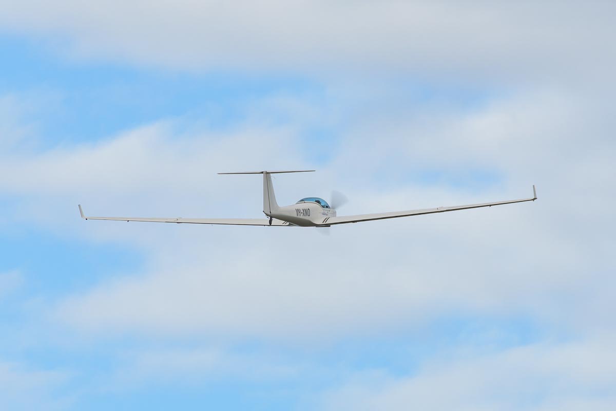 Aeromot AMT-200 Super Ximango powered glider VH-XNO climbing after takeoff at TAVAS GWFD 2018.