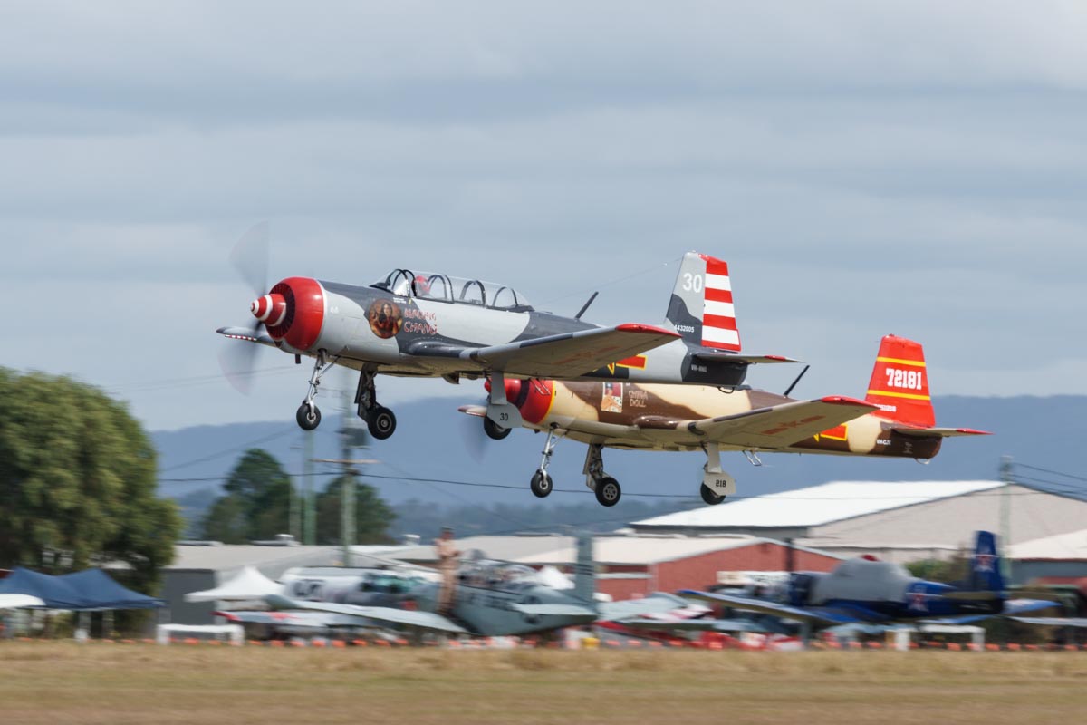 Nanchang CJ-6A VH-NNG and VH-CJX take off for another TFC mission.