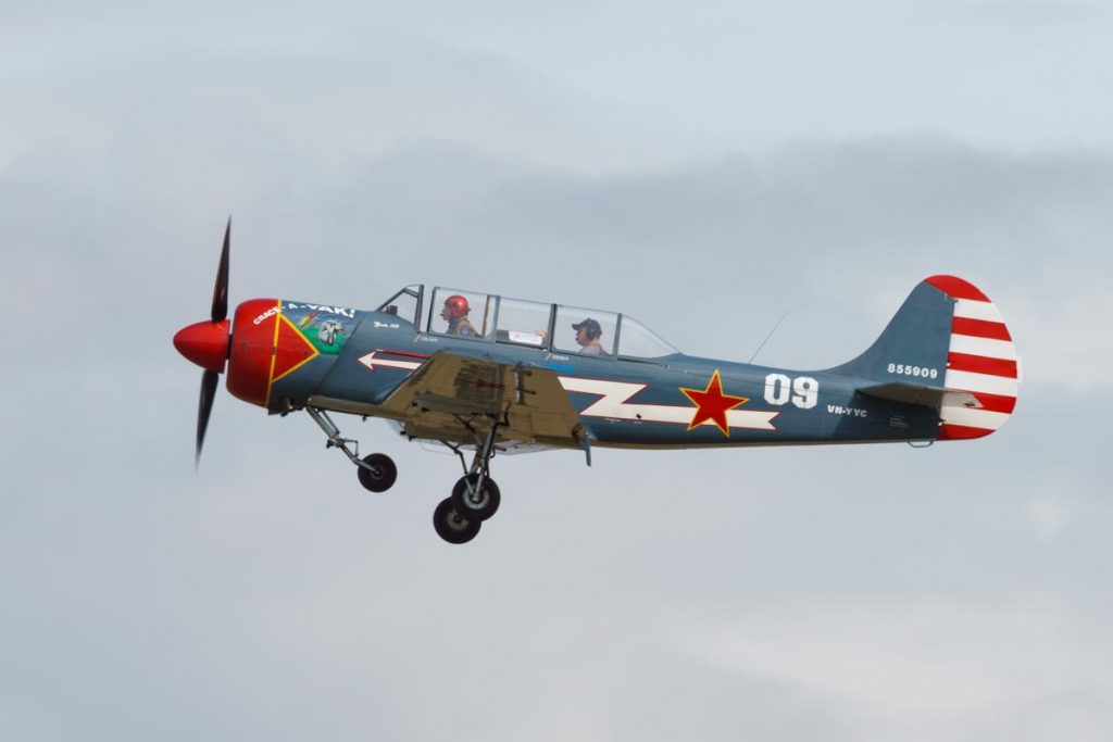 Yakovlev Yak-52 trainer VH-YYC "Crack-A-Yak" takes off.