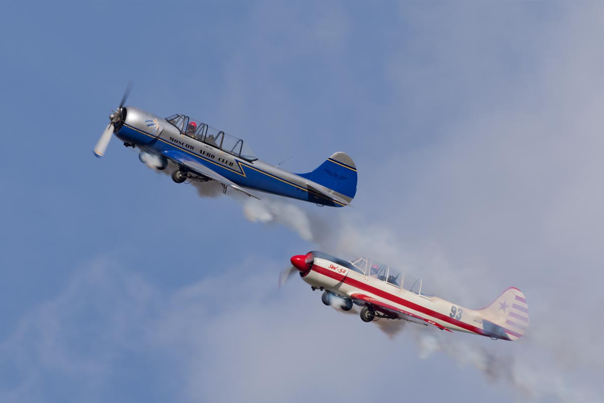 Yakovlev Yak-52s VH-VMI "Vodka Blue" and VH-YYK performing their aerobatic display at Red Thunder 2018 airshow.