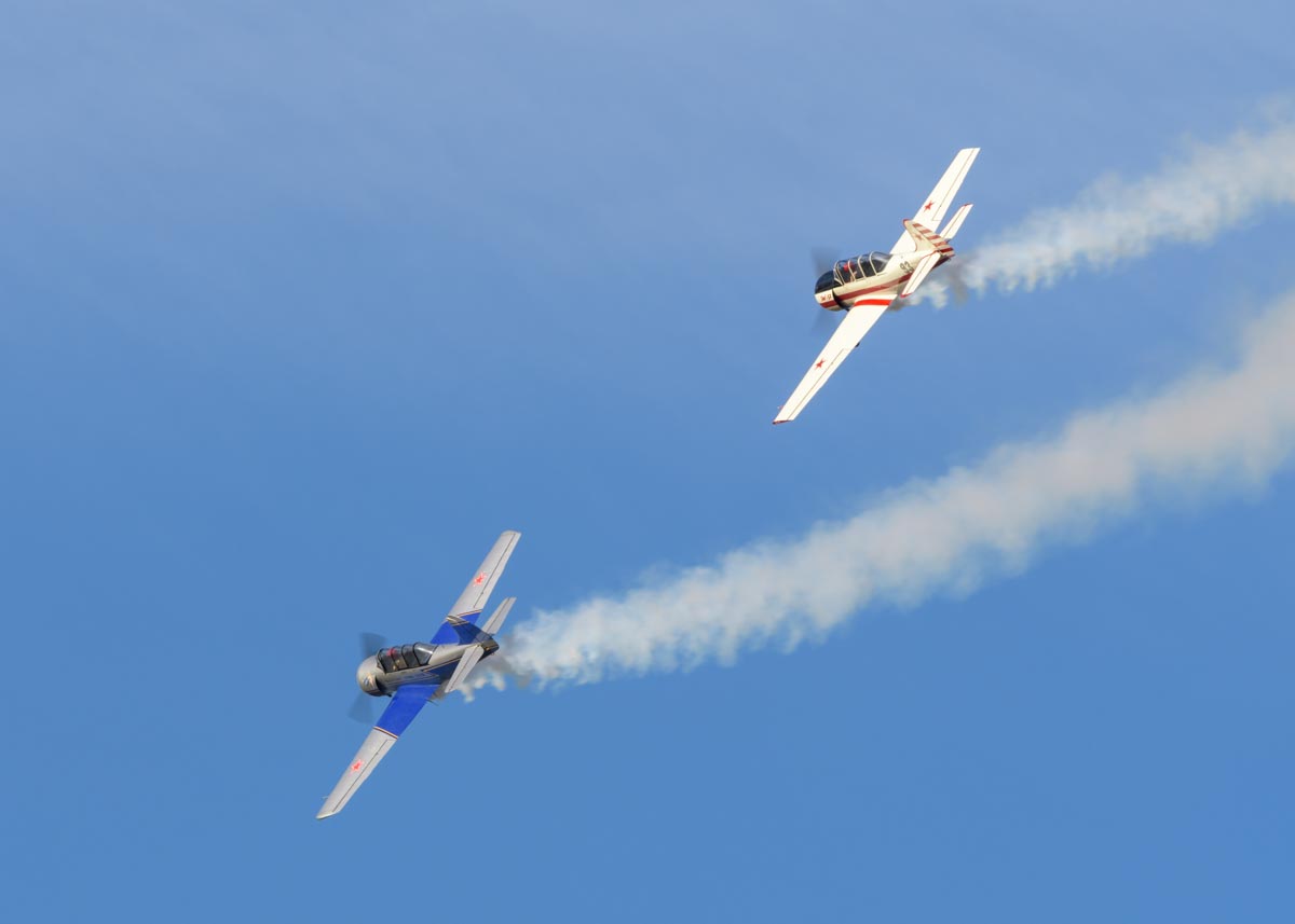 Yakovlev Yak-52s VH-VMI "Vodka Blue" and VH-YYK performing their aerobatic display at Red Thunder 2018 airshow.