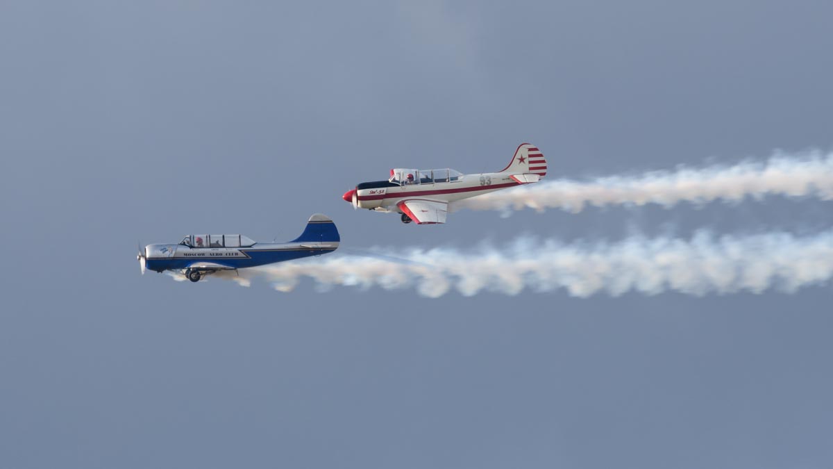 Yakovlev Yak-52s VH-VMI "Vodka Blue" and VH-YYK performing their aerobatic display at Red Thunder 2018 airshow.
