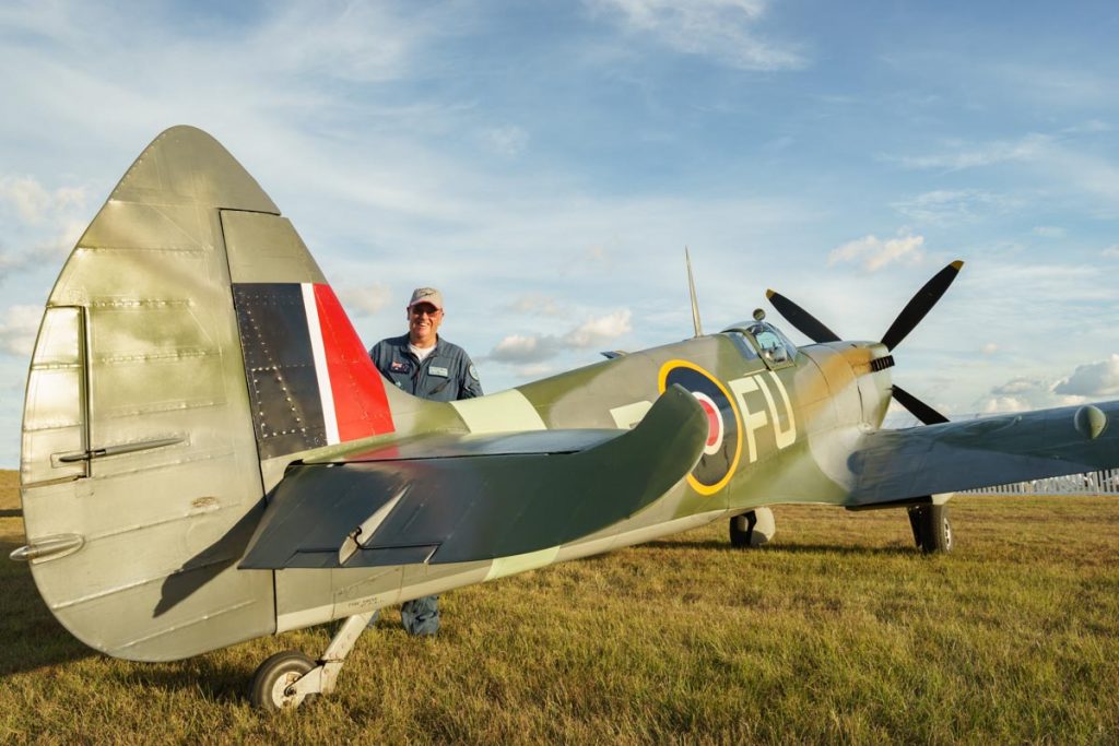 Pilot Stephen Death posing with Supermarine Spitfire Mk XVI VH-XVI at Red Thunder Airshow 2018.