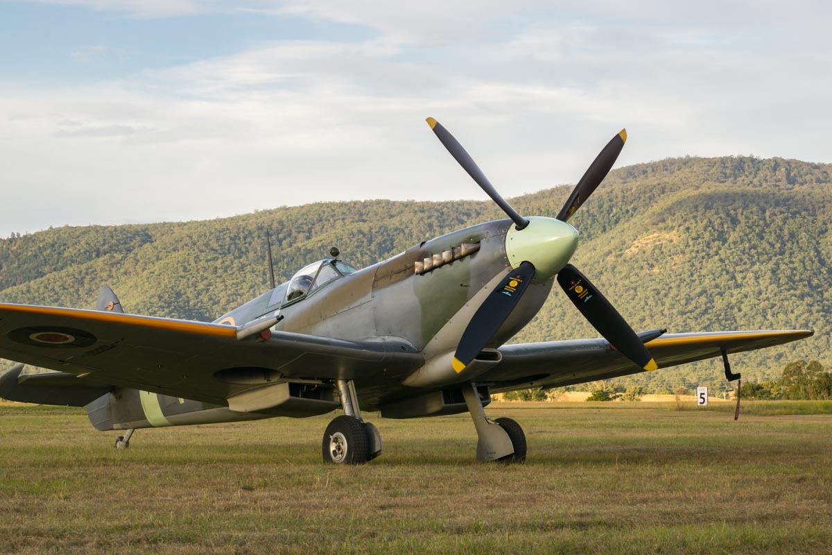 Supermarine Spitfire Mk XVI VH-XVI parked on the airfield with mountain backdrop at Red Thunder Airshow 2018.
