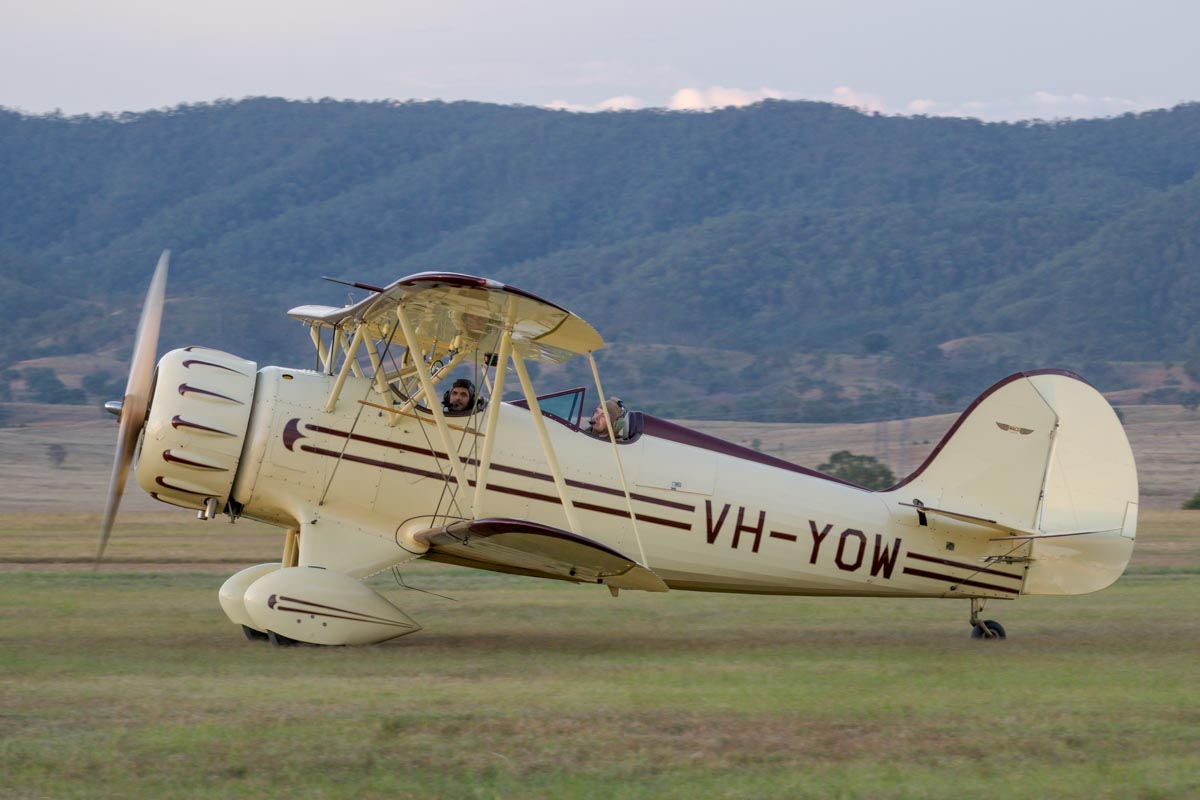Waco YMF-5C biplane VH-YOW taxiing for a joyflight at Red Thunder 2018 airshow.