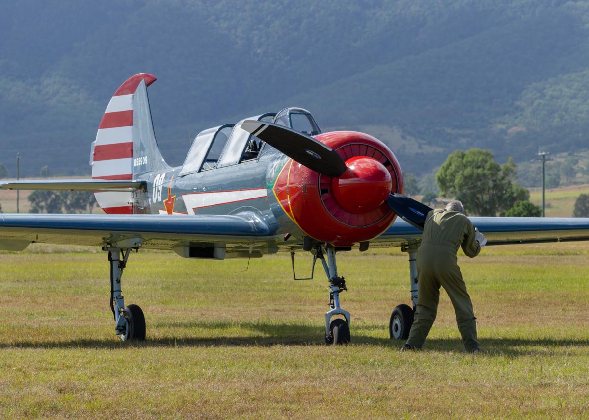 Pilot Peter Scott readies his Yakovlev Yak-52 trainer VH-YYC "Crack-A-Yak"at Red Thunder 2018 airshow.