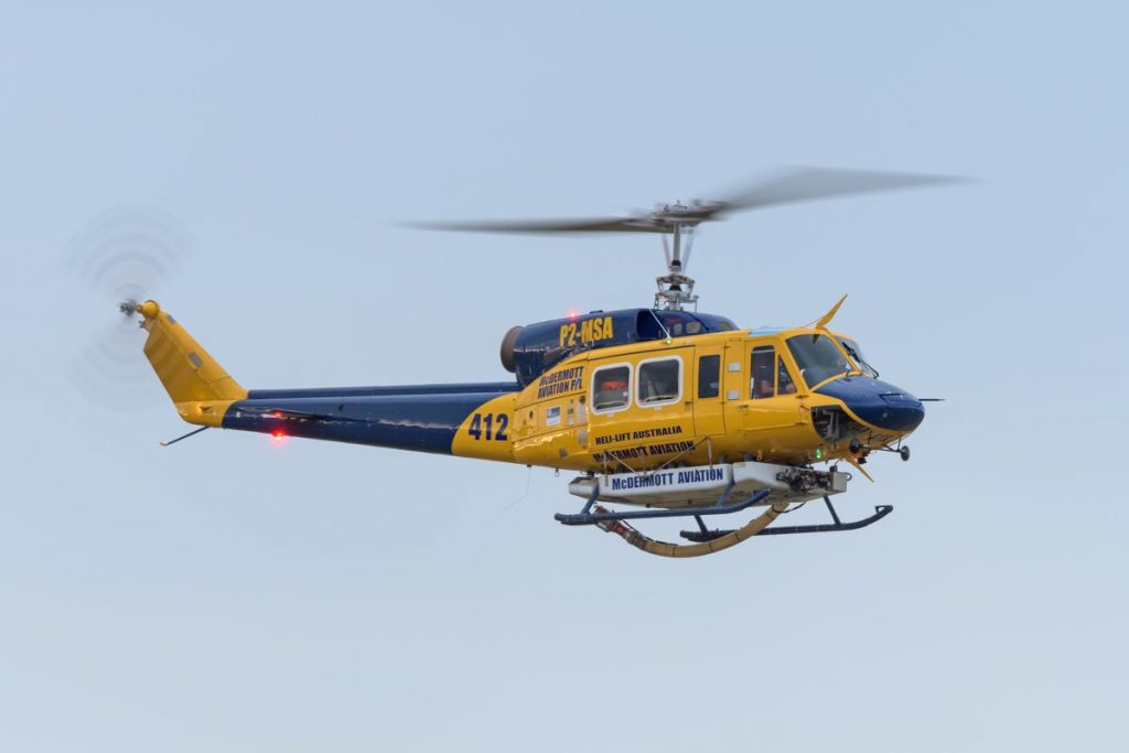 Bell 214B-1 P2-MSA operated by McDermott Aviation in flight.