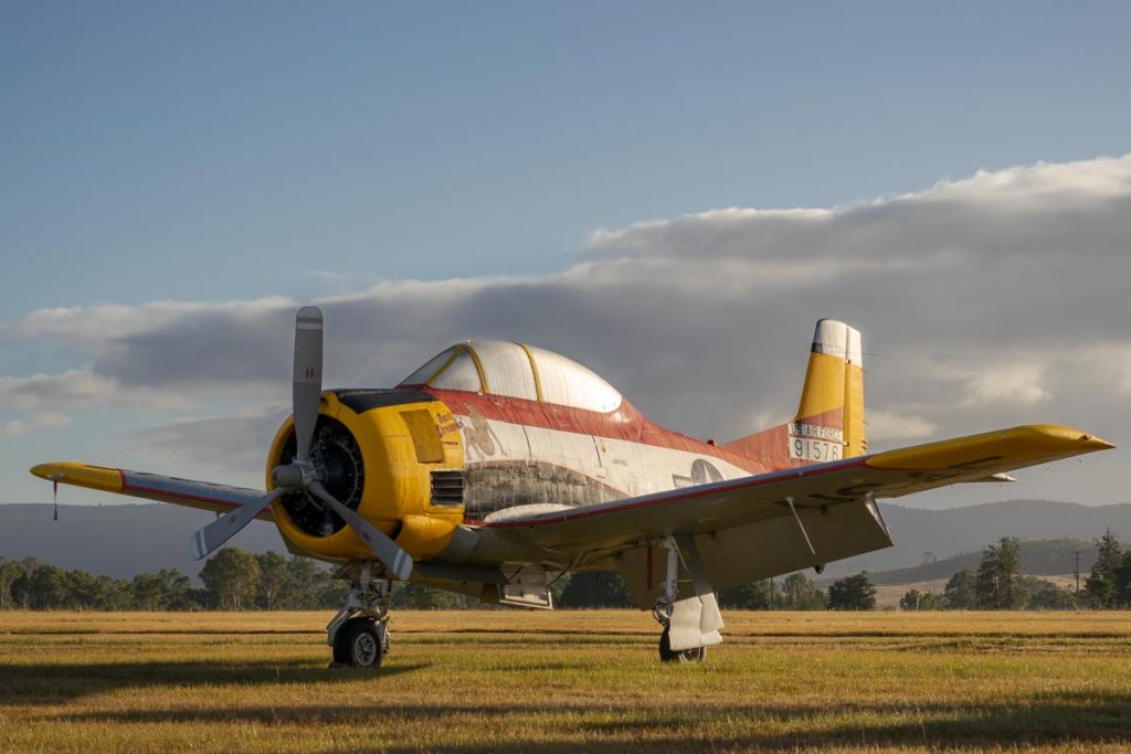 North American T-28D Trojan VH-ZUC "Just Dreamin' " at sunrise.