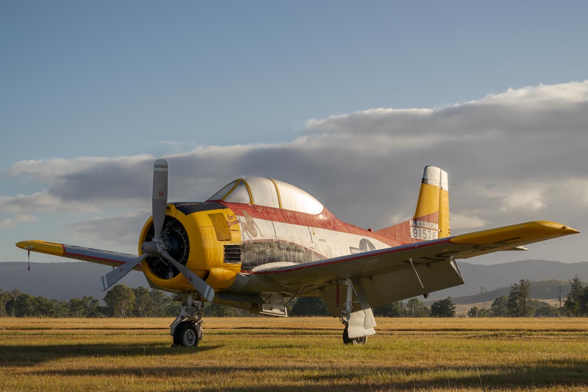 North American T-28D Trojan VH-ZUC "Just Dreamin' " at sunrise.