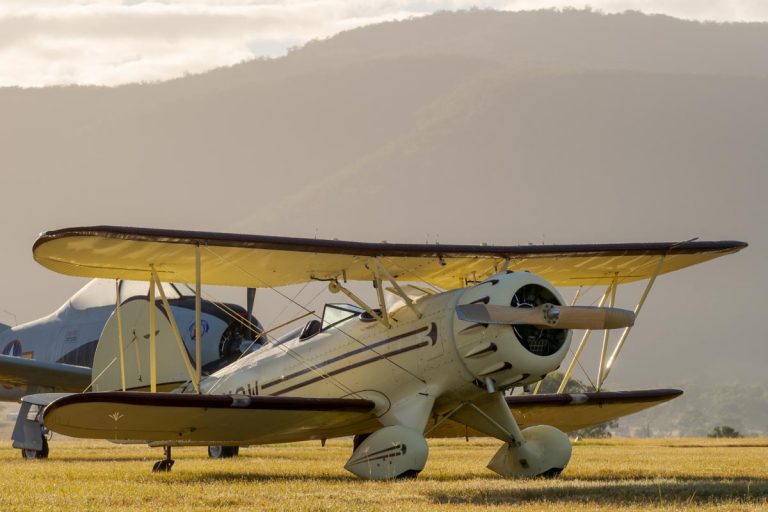 Waco YMF-5C biplane VH-YOW at sunrise.