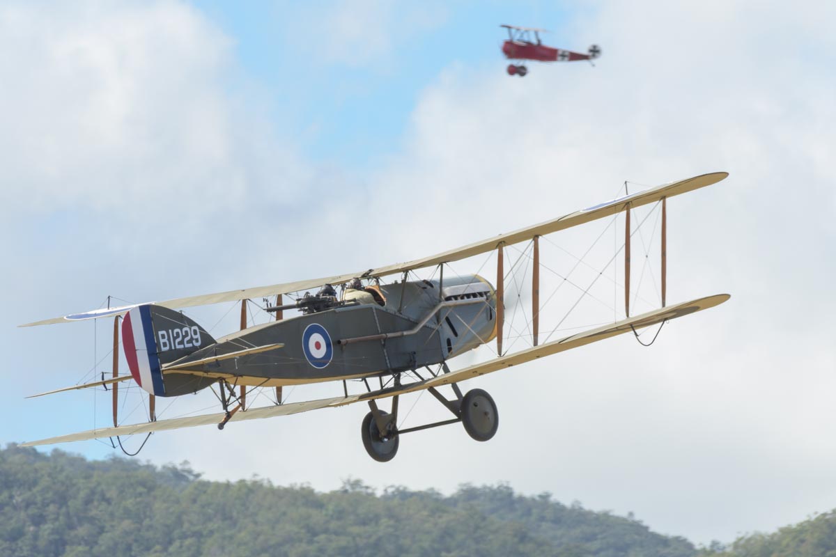 Bristol F.2B VH-IIZ chases Fokker DR.I VH-FXP in the staging of a mock dogfight to re-enact the shooting down of the Red Baron at Red Thunder 2018 airshow.