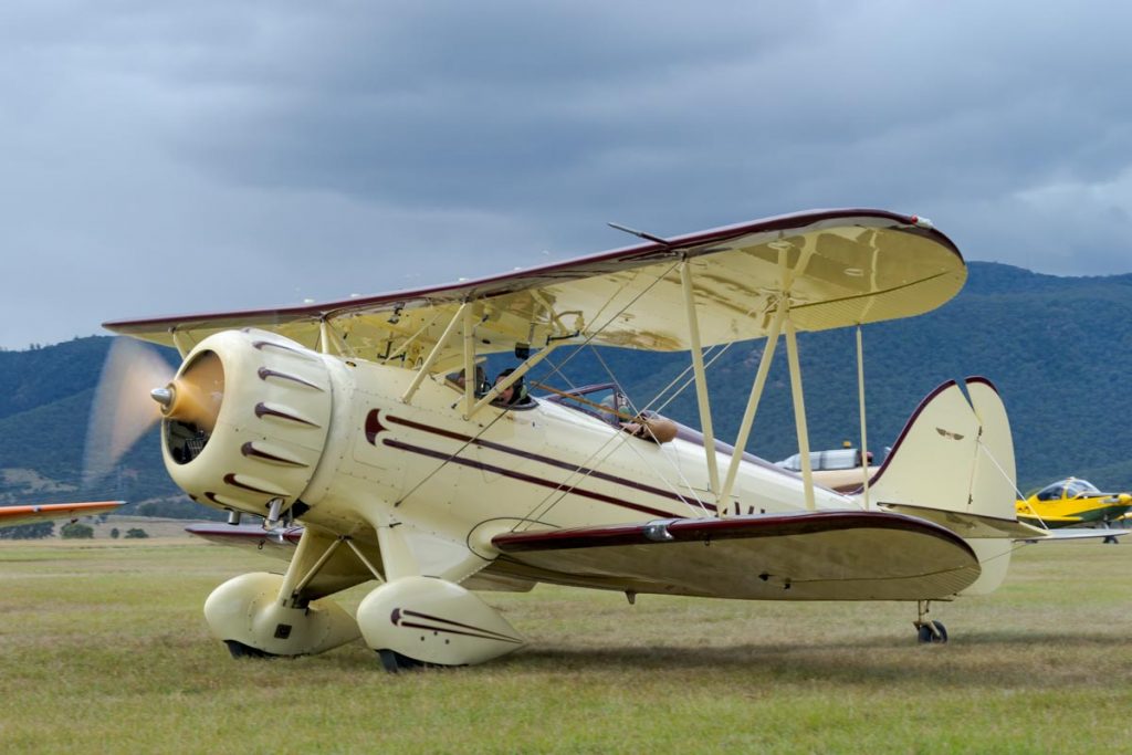 Waco YMF-5C biplane VH-YOW taxiing for a joyflight at Red Thunder 2018 airshow.
