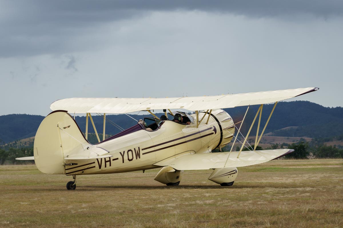 Waco YMF-5C biplane VH-YOW taxiing for a joyflight at Red Thunder 2018 airshow.