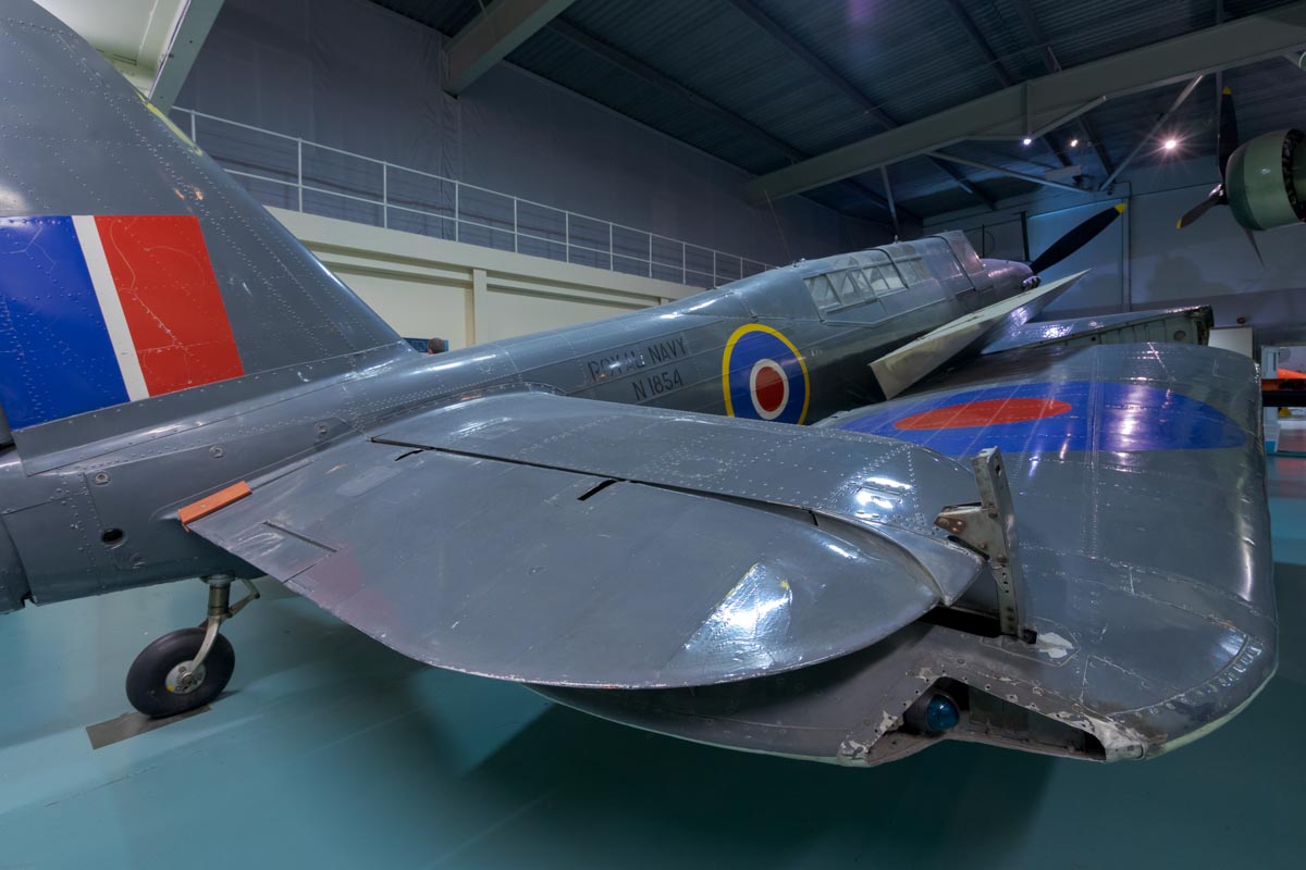 Fairey Fulmar Mk.II G-AIBE (N1854) on display with wings folded at Royal Navy Fleet air Arm Museum.