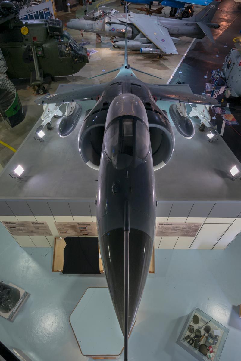 Hawker-Siddeley Sea Harrier FRS.1 XZ493 displayed as about to lift off from an aircraft carrier ski jump ramp at the Royal Navy Fleet Air Arm Museum.