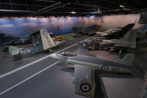 The Aircraft Carrier Experience (Hall 3) display collection, with Supermarine Attacker, de Havilland Sea Vixen, Supermarine Scimitar, McDonnell Douglas Phantom, Hawker Sea Hawk, and Fairey Gannet. Royal Navy Fleet Air Arm Museum.