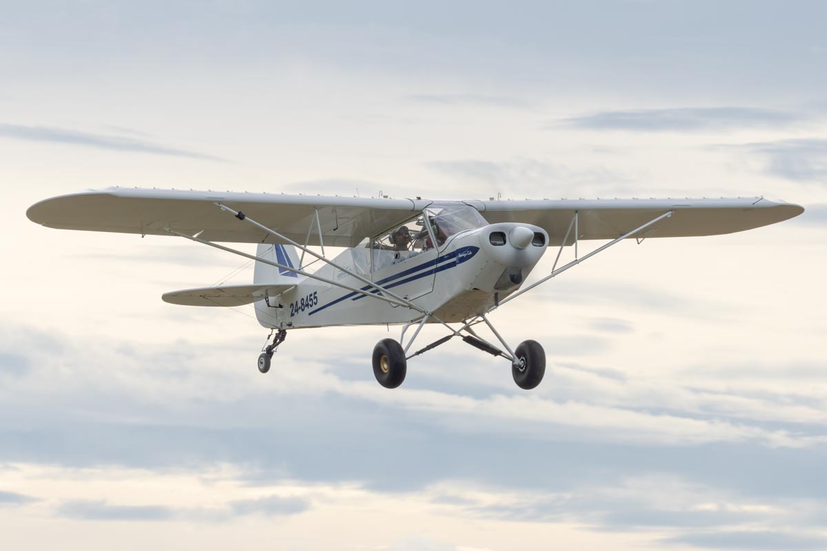 Zlin Savage Cub 24-8455 in flight at the Airsport Qld breakfast fly-in.
