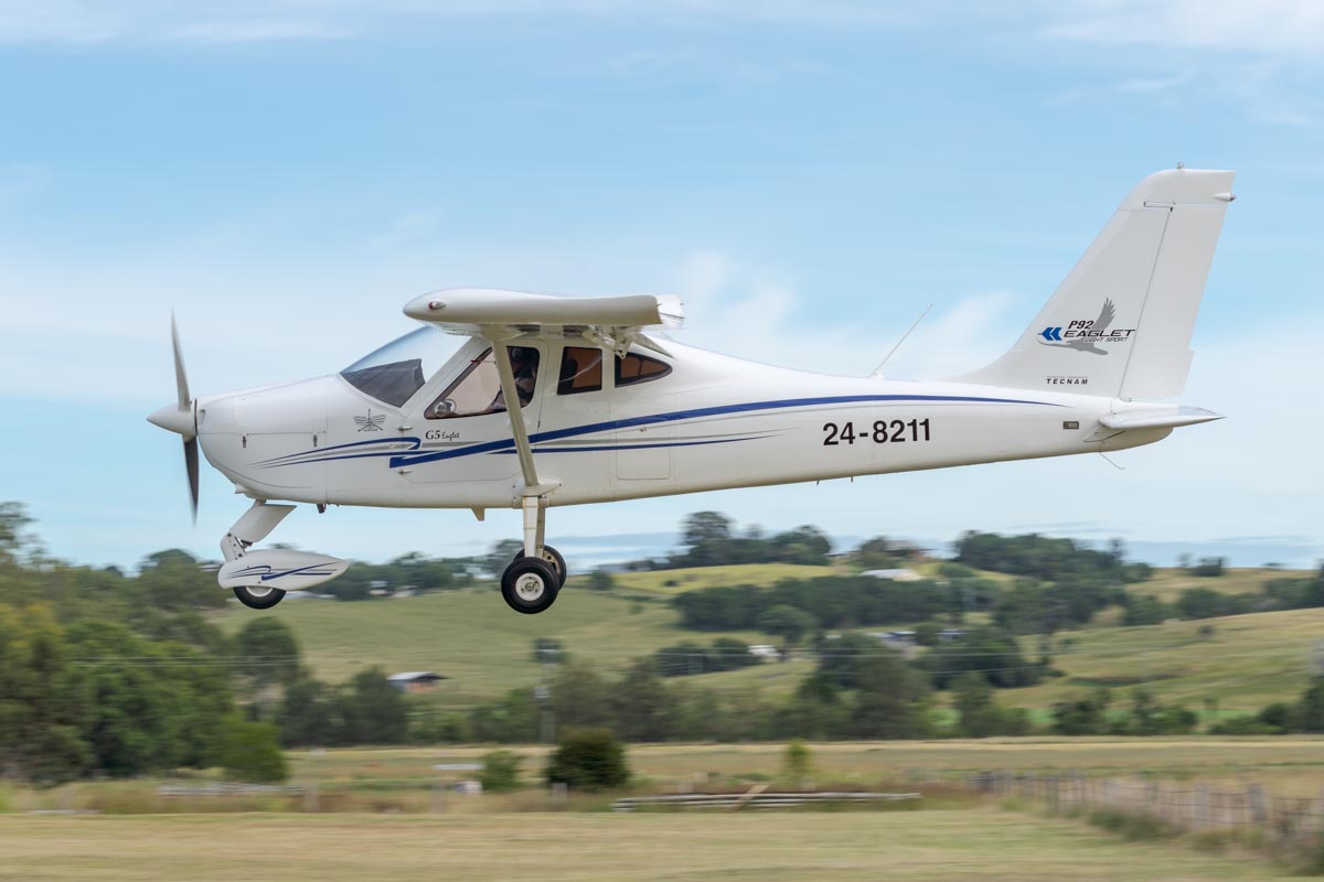 Tecnam P92 Eaglet G5 24-8211 landing at the Airsport Qld breakfast fly-in.