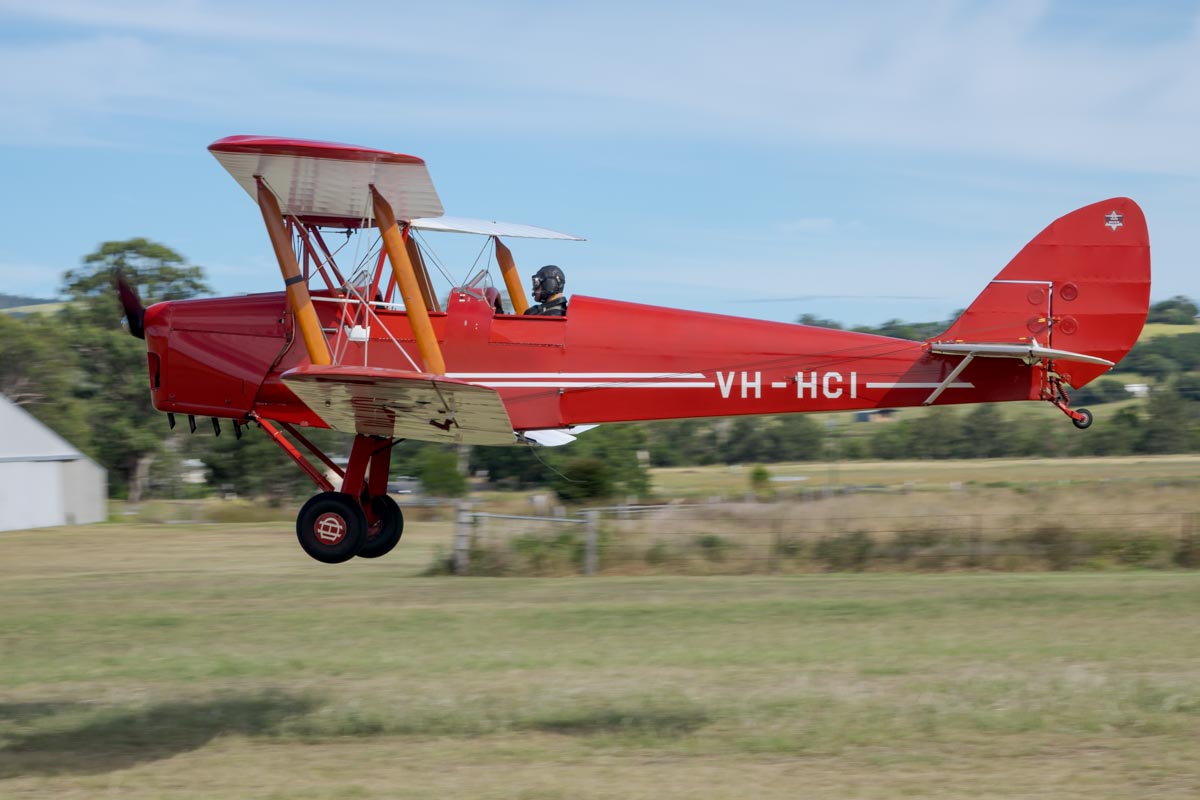 De Havilland DH.82A Tiger Moth VH-HCI landing at the Airsport Qld breakfast fly-in.