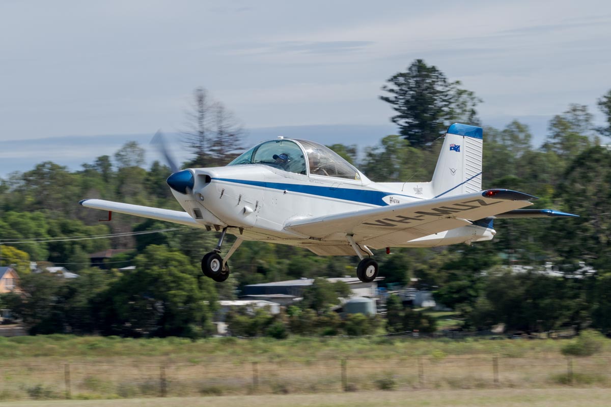 Victa Airtourer 115 VH-MUZ on approach to the Airsport Qld breakfast fly-in.