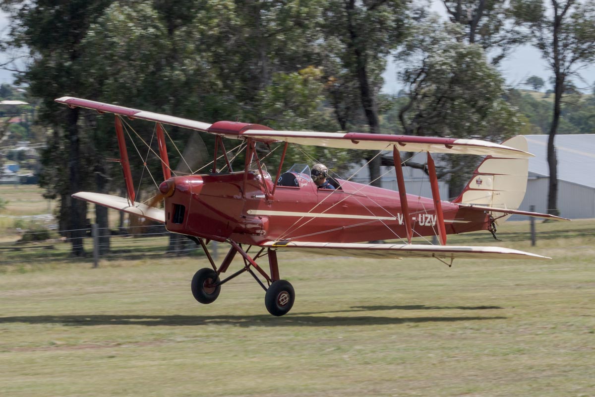 De Havilland DH.82 Tiger Moth VH-UZV takes off at the Airsport Qld breakfast fly-in.