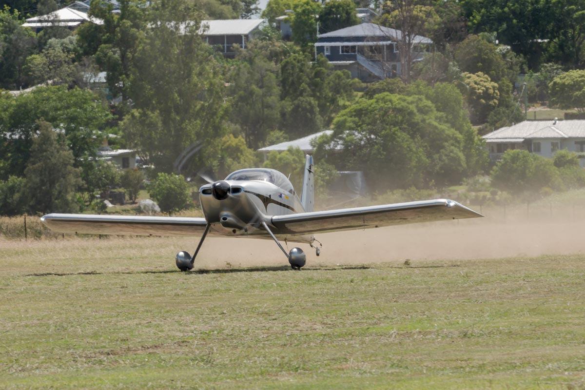 Vans RV-7 VH-LVS kicking up some dust at takeoff at the Airsport Qld breakfast fly-in.