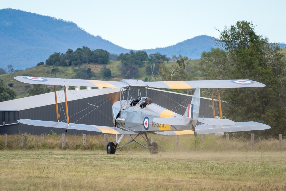 De Havilland DH.82A Tiger Moth VH-WII takes off at the Airsport Qld breakfast fly-in.