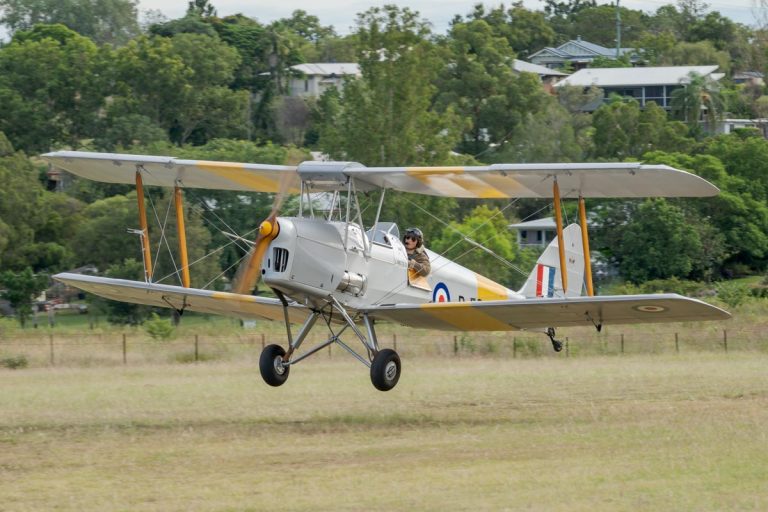 De Havilland DH.82A Tiger Moth VH-WII landing at the Airsport Qld breakfast fly-in.
